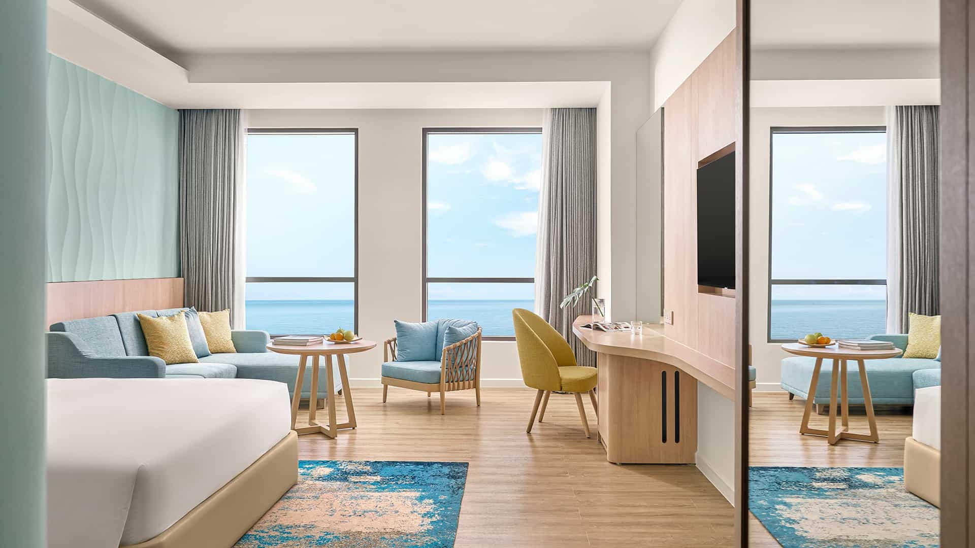 Card Image https://cms.thegrandhotram.com/storage/517/FAMILY-SUITE-OCEAN-Amenity-Sofa.jpg