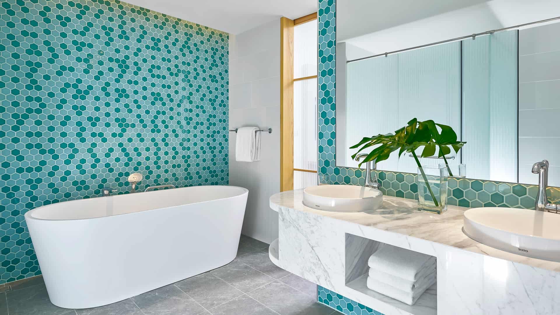 Card Image https://cms.thegrandhotram.com/storage/721/2BR-Suite-Bathroom-Holiday-Inn-Resort.jpg.jpg